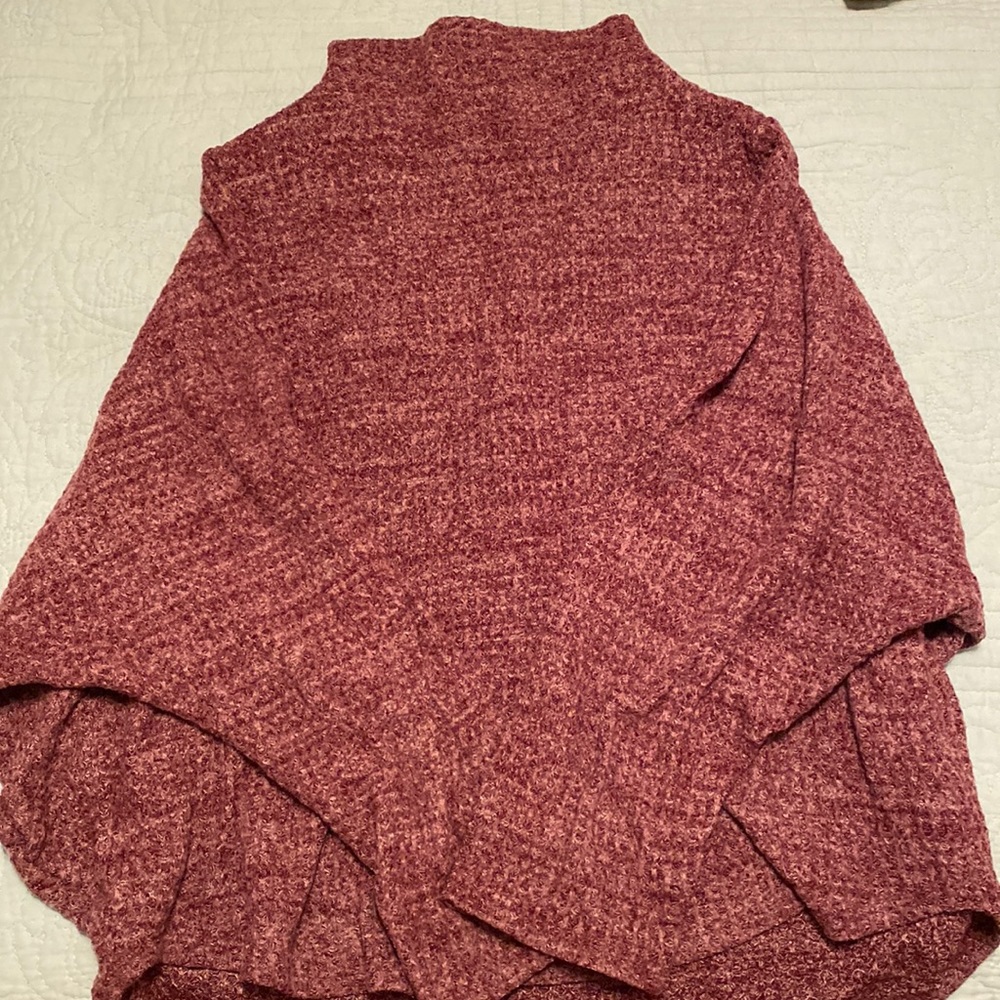 Open back mock turtleneck lightweight sweater.